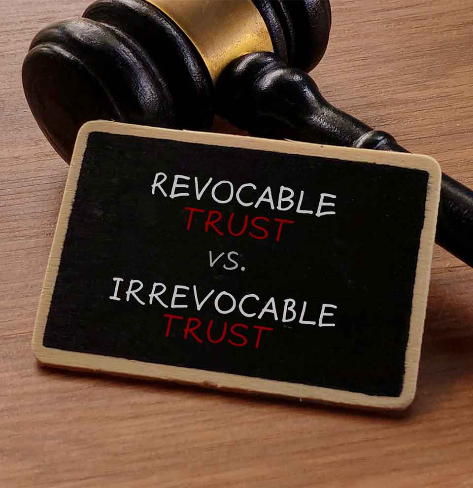 Irrevocable Trust Attorney Denver Gavel beside sign about revocable vs irrevocable trust