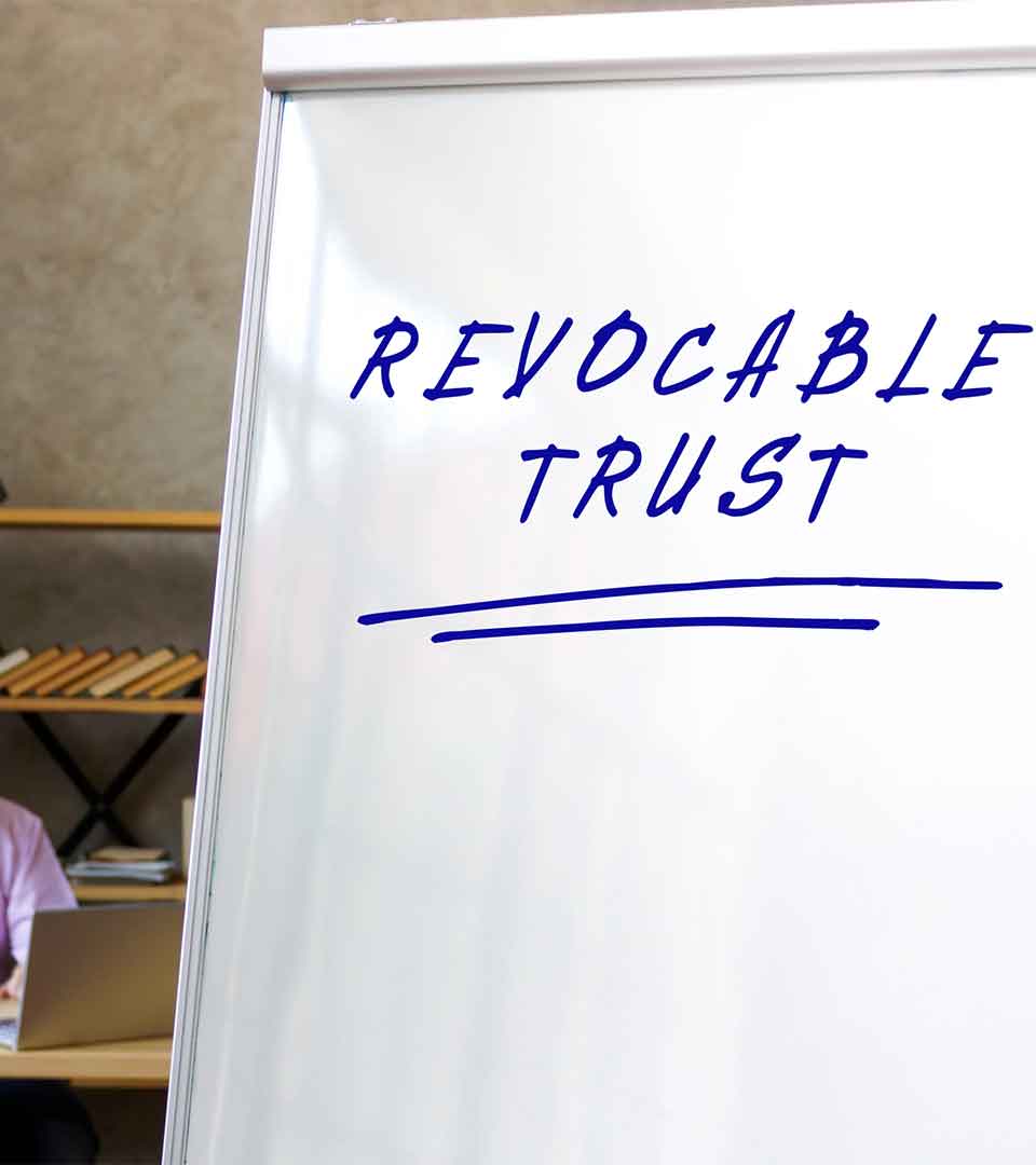 Revocable Living Trust Attorney Denver Whiteboard displaying the words Revocable Trust - Revocable Living Trust Attorney Denver